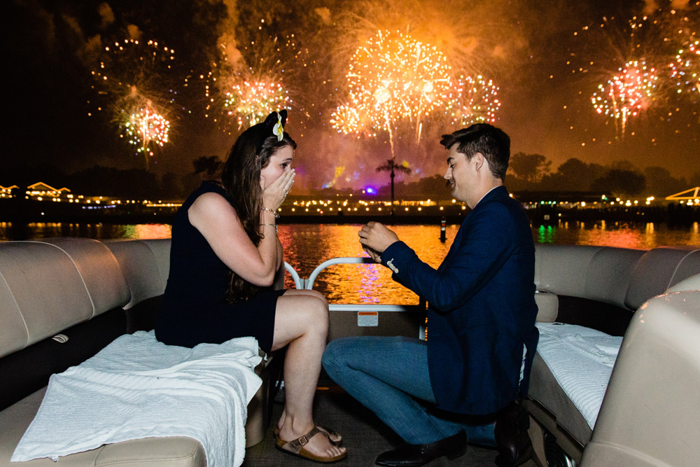 proposal by engaged couple at fourth of july fireworks show